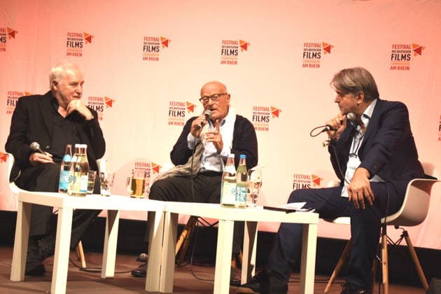 Film Discussion: Return to Montauk Dr. Michael Goetz, Festival Director; Volker Schlöndorff, Director; Rüdiger Suchsland, 2026 Festival Honorary Award Recipient; Moderator: Ludwigshafen, August 28, 2026, on the banks of the Rhine; 22nd German Film Festival 2026 Photo: Ludwigshafen