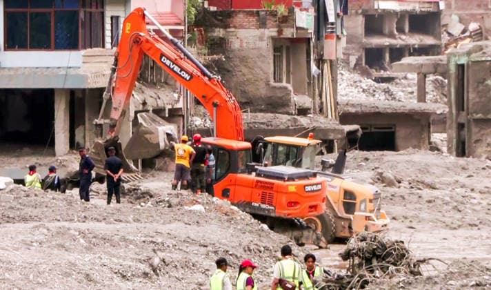 RECORD DATE NOT STATED Debris Clearance Underway in Flood-Damaged Residential Area in Nuwakot Nuwakot Nepal , Aug 30 (ANI): An excavator clears debris from around damaged multi-storey buildings as workers oversee the operation in the aftermath of a devastating flood at Trishuli, in Nuwakot on Sunday. (ANI Video Grab) Nuwakot Nepal Copyright: xANIx ANI_20260830174