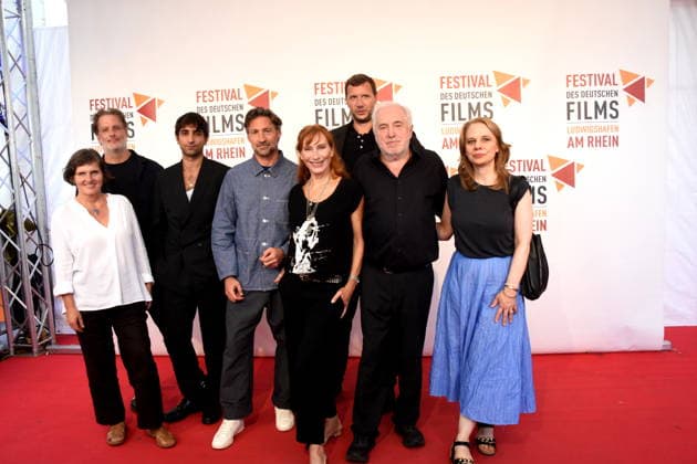 Film: *The Defender: The Lenzi Case*; Daniela Goetz, Festival Director; Stefan Sporbert, Producer; Sergen Meral, Actor; Benjamin Sadler, Actor; Andrea Sawatzki, Actress; Dr. Michael Goetz, Festival Director; Sebastian Marka, Director; Monika Denisch, Editorial Team; Ludwigshafen, August 30, 2026, on the banks of the Rhine 22nd German Film Festival 2026 Photo: Ludw