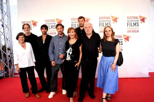 Film: *The Defender: The Lenzi Case*; Daniela Goetz, Festival Director; Stefan Sporbert, Producer; Sergen Meral, Actor; Benjamin Sadler, Actor; Andrea Sawatzki, Actress; Dr. Michael Goetz, Festival Director; Sebastian Marka, Director; Monika Denisch, Editorial Team; Ludwigshafen, August 30, 2026, on the banks of the Rhine 22nd German Film Festival 2026 Photo: Ludw