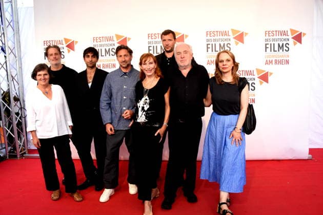 Film: *The Defender: The Lenzi Case*; Daniela Goetz, Festival Director; Stefan Sporbert, Producer; Sergen Meral, Actor; Benjamin Sadler, Actor; Andrea Sawatzki, Actress; Dr. Michael Goetz, Festival Director; Sebastian Marka, Director; Monika Denisch, Editorial Team; Ludwigshafen, August 30, 2026, on the banks of the Rhine 22nd German Film Festival 2026 Photo: Ludw