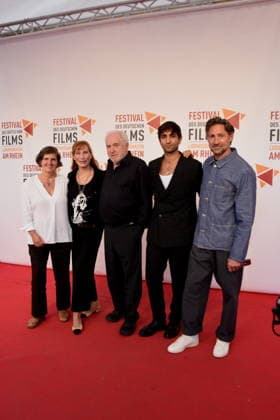 Film: *The Defender: The Lenzi Case* Daniela Goetz, Festival Director; Andrea Sawatzki, Actress; Dr. Michael Goetz, Festival Director; Sergen Meral, Actor; Benjamin Sadler, Actor; Ludwigshafen, August 30, 2026, on the banks of the Rhine; 22nd German Film Festival 2026; Photo: Ludwigshafen