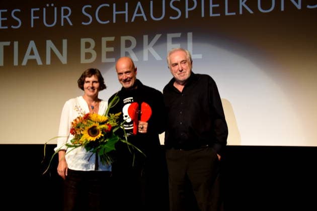 Daniela Goetz, Festival Director; Christian Berkel, Actor; 2026 Festival Award Winner for Acting; Dr. Michael Goetz, Laudator; Festival Director, Ludwigshafen, August 30, 2026, on the banks of the Rhine; 22nd German Film Festival 2026; Photo: Ludwigshafen
