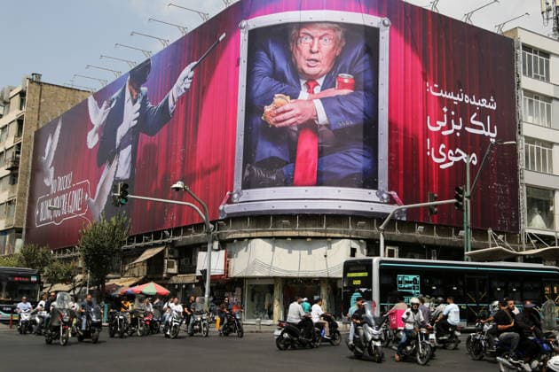 Giant anti-US billboard displayed in Tehran amid rising Iran-US Tensions TEHRAN, IRAN - AUGUST 31: ( RESTRICTIONS: NO Access Israel Media Persian Language TV Stations Outside Iran Strictly No Access BBC Persian VOA Persian Manoto TV Iran International TV ) Pedestrians pass beneath a giant anti-US billboard displayed in Tehran as tensions between Iran and the United States continue, on August 31, 2026 in Tehran, Iran. The US military reportedly carried out an attack on Iran s Larak Island, while Iran s Islamic Revolutionary Guard Corps said the strike caused deaths and injuries among military personnel and civilians. Fatemeh Bahrami Anadolu Tehran Iran. Editorial use only. Please get in touch for any other usage.  Copyright: x2026xAnadoluxFatemehxBahramix