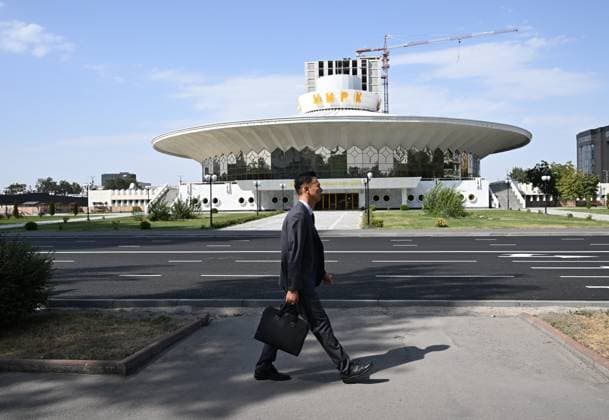 Kyrgyzstan SCO Summit Preparations 9231726 31.08.2026 A man walks past the Kyrgyz State Circus in Bishkek, Kyrgyzstan. The Shanghai Cooperation Organization (SCO) summit will be held in the Kyrgyz capital from August 31 to September 1. Kristina Solovyova Sputnik Bishkek Kyrgyzstan  Copyright: xKristinaxSolovyovax