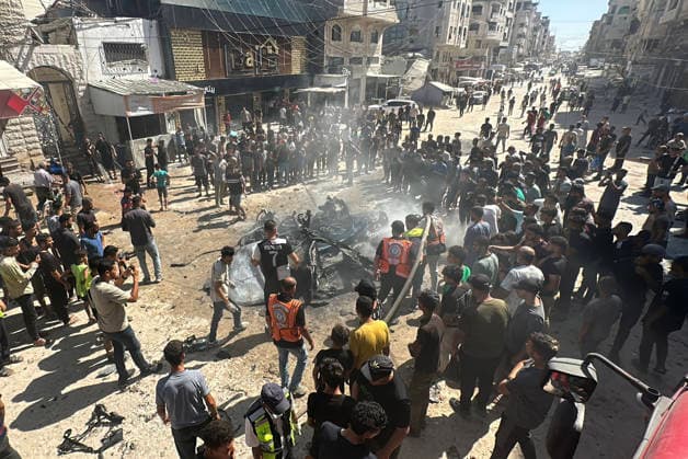 Palestinians Gather at Site of Israeli Strike in Gaza City Palestinians gather at the site of an Israeli strike that targeted a civilian vehicle in the Tal al-Hawa neighborhood of Gaza City on August 31, 2026, as firefighters try to extinguish a fire at the scene. Medics recovered the bodies of three Palestinians who were killed in the strike. Photo by Hadi Daoud apaimages Gaza city Gaza Strip Palestinian Territory 310826_Gaza_HD_00(25) Copyright: xapaimagesxHadixDaoudx xapaimagesx