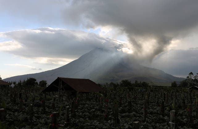 Indonesia s Sinabung volcano sends ash column 3.5 kilometers into the sky KARO, INDONESIA - AUGUST 31: A thick column of volcanic ash billows into the sky as Mount Sinabung continues to spew volcanic material in Karo Regency, North Sumatra, Indonesia, on August 31, 2026. The volcano erupted violently on Monday morning, sending ash clouds soaring approximately 3,500 meters (3.5 kilometers) above its summit, blanketing surrounding areas and prompting heightened monitoring by local authorities. Risky Cahyadi Anadolu Karo Indonesia. Editorial use only. Please get in touch for any other usage.  Copyright: x2026xAnadoluxRiskyxCahyadix