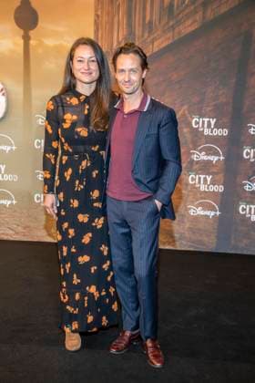 ABB CITYBLOOD: Annie Mosebach and her husband Tom Schilling attend the premiere of the German Hulu Original series *City of Blood* at Kino International on August 31, 2026, in Berlin, Germany