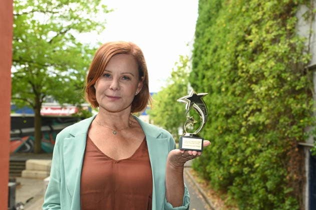 Actress Petra Blossey poses at the big fan gathering and awards ceremony for the RTL series *Unter Uns*