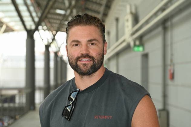 Actor Benjamin Heinrich poses at the big fan gathering and awards ceremony for the RTL series *Unter Uns*