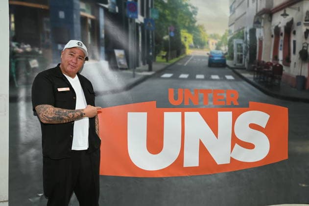 Actor Ramon Ademes, a well-known Cologne cult figure known as a bouncer and singer, poses at the big fan gathering and awards ceremony for the RTL series *Unter Uns*