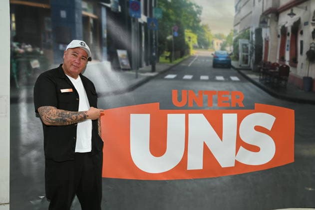 Actor Ramon Ademes, a well-known Cologne cult figure known as a bouncer and singer, poses at the big fan gathering and awards ceremony for the RTL series *Unter Uns*