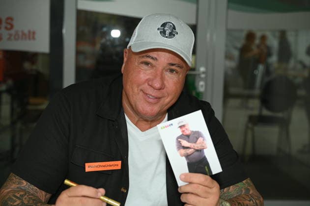 Actor Ramon Ademes, a well-known Cologne cult figure, bouncer, and singer, poses at the big fan gathering and awards ceremony for the RTL series *Unter Uns*