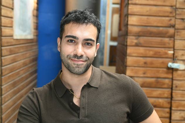 Actor Metehan Demiröz poses at the big fan meet-and-greet and awards ceremony for the RTL series *Unter Uns*