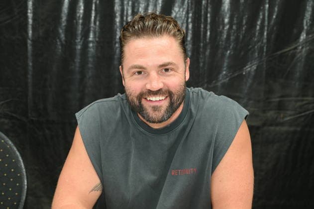 Actor Benjamin Heinrich poses at the big fan meet-and-greet and awards ceremony for the RTL series *Unter Uns*