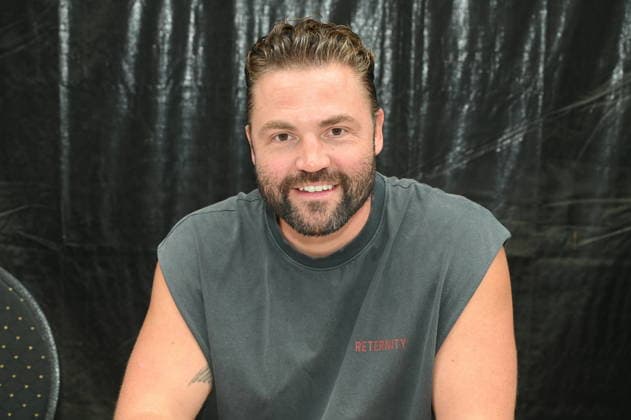 Actor Benjamin Heinrich poses at the big fan meet-and-greet and awards ceremony for the RTL series *Unter Uns*