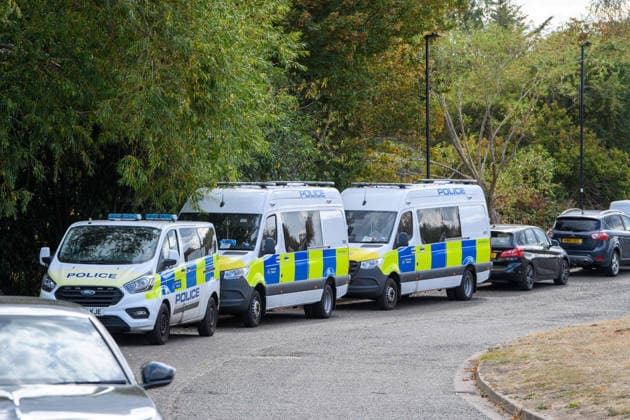 September 1, 2026, London, London, UK: London, UK. Police vehicles on scene at The Pits at the Bedfont Recreation Ground following the discovery of human remains. Three weeks after human remains were discovered in woodland in Feltham, the police investigation and searches of the surrounding area remain ongoing. Detectives from the Metropolitan Police Service launched a murder investigation following the discovery of human remains in woodland adjacent to Padstow Walk, Feltham. Police were called at 6:35pm on Wednesday, 12 August, following reports that bones had been found in the woodland. Subsequent examinations confirmed the remains were human. The remains are believed to belong to a woman aged approximately between 25 and 45 years old.  - ZUMAl94_ 20260901_zaf_l94_028 Copyright: xPeterxManningx