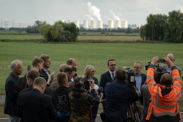 September 1, 2026, Turnow Preilack, Germany: Brandenburg officials speak to the media near the site where improvised rockets reportedly struck a power substation. A power plant is seen in the background. Authorities are investigating the incident. Brandenburgs economy minister Martina Klement and Interior Minister Dr. Jan Redmann Turnow Preilack Germany - ZUMAs319 20260901_znp_s319_023 Copyright: xGabyxSchuetzex