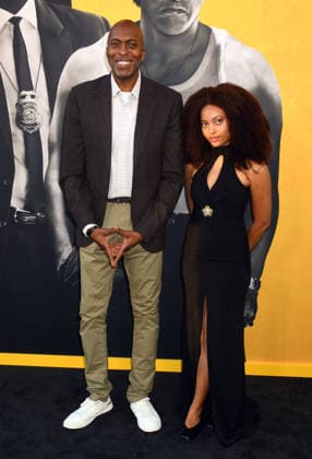 LOS ANGELES, CA - SEPTEMBER 1: John Salley and Taya Salley at the LA premiere of By Any Means on September 1, 2026 at Paramount Theatre in Los Angeles, California. Copyright: xJeffreyxMayerx