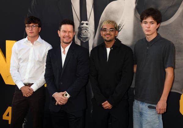 LOS ANGELES, CA - SEPTEMBER 1: Michael Wahlberg, Mark Wahlberg, N3on and Brendan Joseph Wahlberg at the LA premiere of By Any Means on September 1, 2026 at Paramount Theatre in Los Angeles, California. Copyright: xJeffreyxMayerx