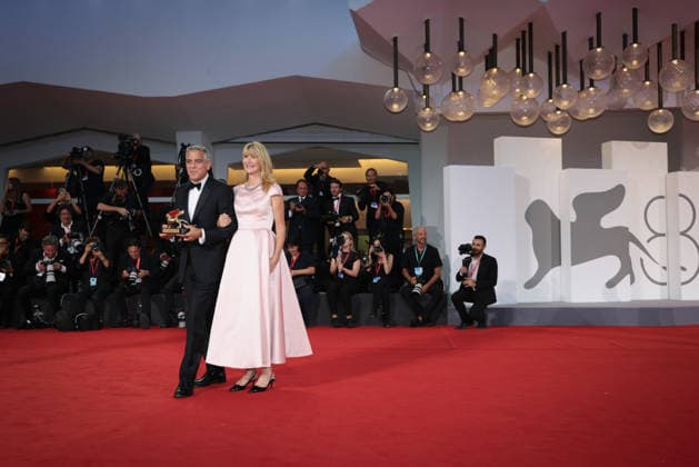 Opening Ceremony & Golden Lion For Lifetime Achievement Award To George Clooney George Clooney poses on the red carpet with Laura Dern after receiving the Golden Lion for Lifetime Achievement Award during the Opening Ceremony the 83rd Venice International Film Festival at Sala Grande on September 02, 2026 in Venice, Italy.  Copyright: xKazukoxWakayamax