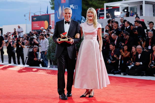 September 2, 2026, Venice, ITALY: US actor George Clooney (L), next to US actor Laura Dern, poses after he received the Golden Lion Lifetime Achievement Award at the opening ceremony of the 83rd annual Venice International Film Festival, in Venice, Italy, 02 September 2026. The festival runs from 02 to 12 September 2026. ANSA FABIO FRUSTACI. Venice ITALY  - ZUMAa110 20260902_zaf_a110_086 Copyright: xFabioxFrustacix