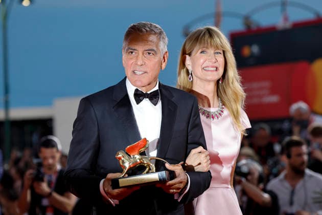 September 2, 2026, Venice, ITALY: US actor George Clooney (L), next to US actor Laura Dern, poses after he received the Golden Lion Lifetime Achievement Award at the opening ceremony of the 83rd annual Venice International Film Festival, in Venice, Italy, 02 September 2026. The festival runs from 02 to 12 September 2026. ANSA FABIO FRUSTACI. Venice ITALY  - ZUMAa110 20260902_zaf_a110_087 Copyright: xFabioxFrustacix