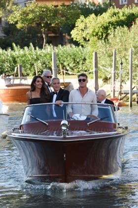 IPA88040579 - Venice: George Clooney arrives at the dock for the Golden Lion award ceremony and leaves with the prize; pictured: George Clooney and Amal Alamuddin  Copyright: xFRANCESCAxVIECELIx xFrancescaxViecelix 88040579