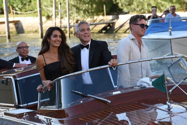 IPA88040583 - Venice: George Clooney arrives at the dock for the Golden Lion award ceremony and leaves with the prize; pictured: George Clooney and Amal Alamuddin  Copyright: xFRANCESCAxVIECELIx xFrancescaxViecelix 88040583