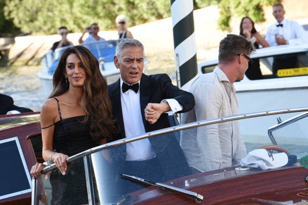 IPA88040588 - Venice: George Clooney arrives at the dock for the Golden Lion award ceremony and leaves with the prize; pictured: George Clooney and Amal Alamuddin  Copyright: xFRANCESCAxVIECELIx xFrancescaxViecelix 88040588