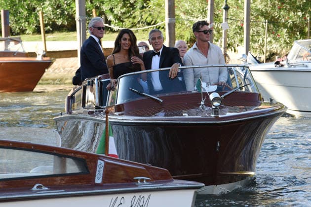 IPA88040574 - Venice: George Clooney arrives at the dock for the Golden Lion award ceremony and leaves with the prize; pictured: George Clooney and Amal Alamuddin  Copyright: xFRANCESCAxVIECELIx xFrancescaxViecelix 88040574
