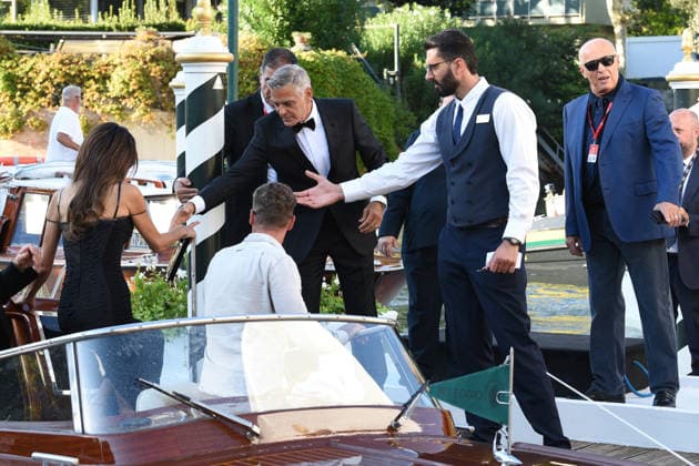 IPA88040604 - Venice: George Clooney arrives at the dock for the Golden Lion award ceremony and leaves with the prize; pictured: George Clooney and Amal Alamuddin  Copyright: xFRANCESCAxVIECELIx xFrancescaxViecelix 88040604
