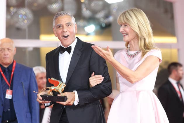 September 2, 2026, Venice, Italy: George Clooney and Laura Dern pose with the George Clooney Golden Lion For Lifetime Achievement during the 83rd Venice International Film Festival at Palazzo del Cinema on the Lido in Venice, Italy, on 02 September 2026. Photo: Venice Italy - ZUMAm179 20260902_zep_m179_038 Copyright: xAlecxMichaelx