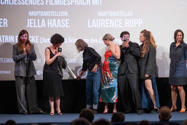 GENTLE MONSTER Premiere: On-Stage Presentation with Q&A Featuring Marie Kreutzer, Jella Haase, Laurence Rupp, and Host Katrin Rönicke. GENTLE MONSTER Premiere at the Delphi Filmpalast Cinema in Berlin Copyright: xEventpressx