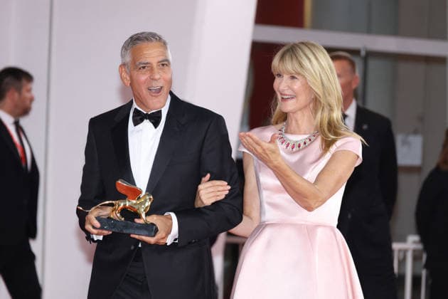 Venise 2026 Ink Screening George Clooney Golden Lion NB George Clooney poses with Laura Dern after receiving the Golden Lion for Lifetime Achievement Award attending the Ink Red carpet Opening Ceremony as part of the 83th Venice International Film Festival at the Lido in Venice, Italy on September 02, 2025. Photo by Nasser Berzane ABACAPRESS.COM Venise  Copyright: xBerzanexNasser ABACAx