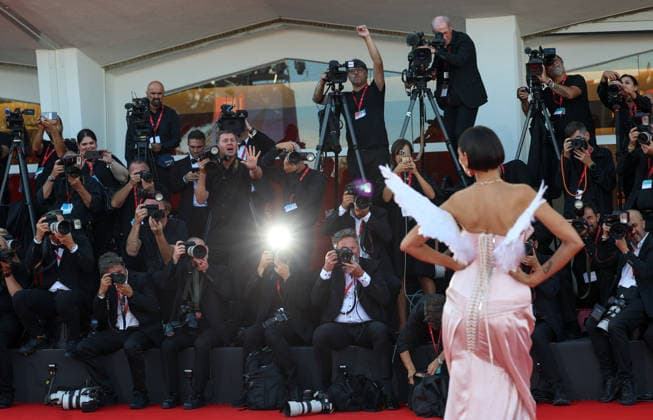 (260902) -- VENICE, Sept. 2, 2026 -- Journalists work at the red carpet of the opening ceremony of the 83rd Venice International Film Festival in Venice, Italy, Sept. 2, 2026. The 83rd Venice International Film Festival opened Wednesday on Lido island in Venice, Italy, with 21 films competing for the Golden Lion for Best Film. ) ITALY-VENICE-FILM FESTIVAL-OPENING WangxKaiyan 