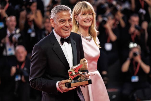 September 2, 2026, Venice, Italy: American actor and producer, George Clooney and american actress, Laura Dern seen holding the Honorary Golden Lion Award at the 83rd Venice International Film Festival at the Palazzo del Cinema. Venice Italy - ZUMAs197 20260902_aaa_s197_515 Copyright: xMarcoxBaradax