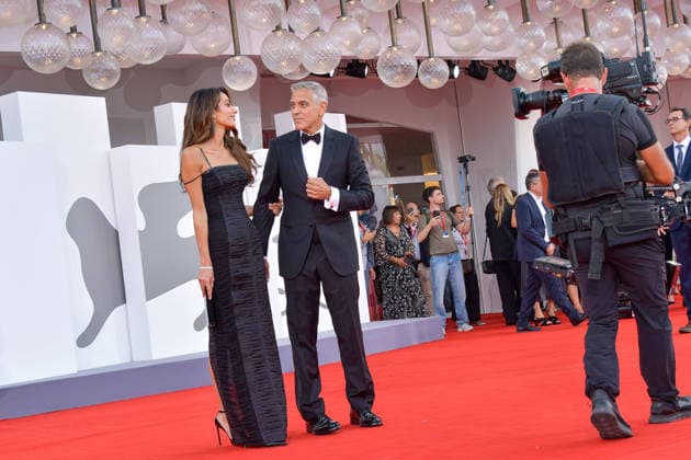 Title: 83rd Venice Film Festival Red Carpet 83rd Venice Film Festival Venice International Film Festival George Clooney on the opening red carpet George Clooney attends the Golden Lion for Lifetime Achievement red carpet with his wife Amal and poses with the award after the ceremony, accompanied in part by Laura Dern. Photos by Thomas Bohlen. Starface 459342 2026 09 02 Venice, Italy  Copyright: xThomasxBohlenx STAR_459342_364
