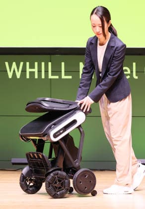 September 3, 2026, Tokyo, Japan - Japanese personal mobility company Whill unveils the new lighweight folding electric wheelchair Whill Model C Lite in Tokyo on Thursday, September 3, 2026. The new mobility weighing 18.6kg body with carbon fiver reinforced plastics parts has omni-directional wheels for front wheels and high performance battery to drive 38.5km of distance. (photo by Yoshio Tsunoda AFLO)  aflo_344739876