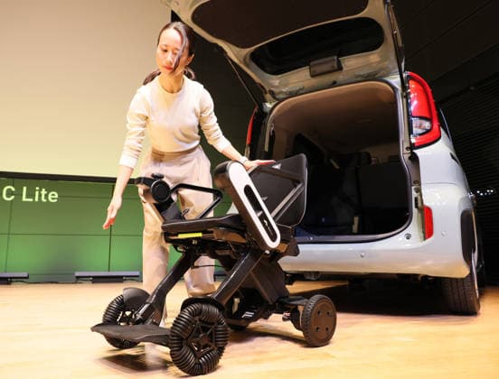 September 3, 2026, Tokyo, Japan - Japanese personal mobility company Whill unveils the new lighweight folding electric wheelchair Whill Model C Lite in Tokyo on Thursday, September 3, 2026. The new mobility weighing 18.6kg body with carbon fiver reinforced plastics parts has omni-directional wheels for front wheels and high performance battery to drive 38.5km of distance. (photo by Yoshio Tsunoda AFLO)  aflo_344739886