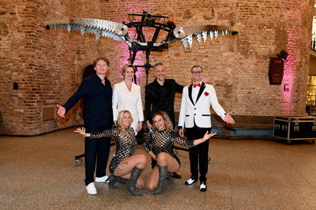 Ilja and Katja Smitt pose alongside clown Cesar Dias and illusionist Peter Valance at the program presentation for the 11th Cologne Christmas Circus