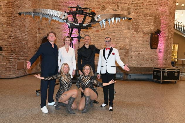Ilja and Katja Smitt pose alongside clown Cesar Dias and illusionist Peter Valance at the program presentation for the 11th Cologne Christmas Circus