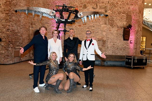 Ilja and Katja Smitt pose alongside clown Cesar Dias and illusionist Peter Valance at the program presentation for the 11th Cologne Christmas Circus