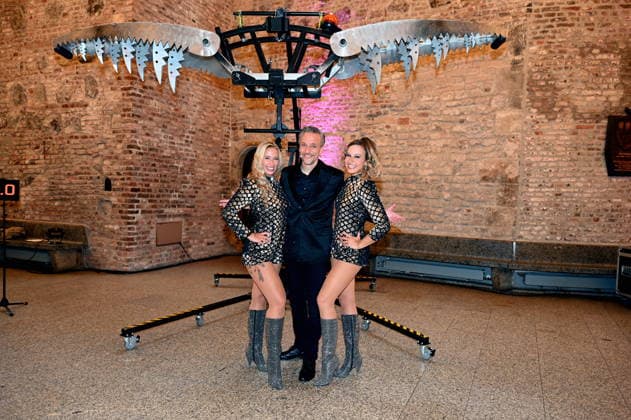 Illusionist Peter Valance poses with his assistant at the program presentation for the 11th Cologne Christmas Circus