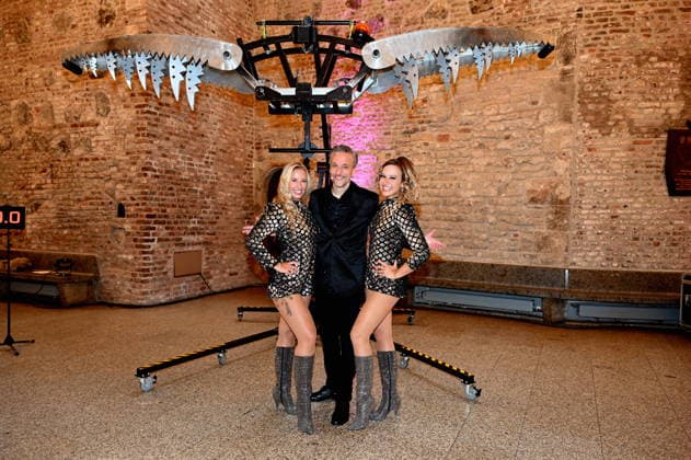 Illusionist Peter Valance poses with his assistant at the program presentation for the 11th Cologne Christmas Circus