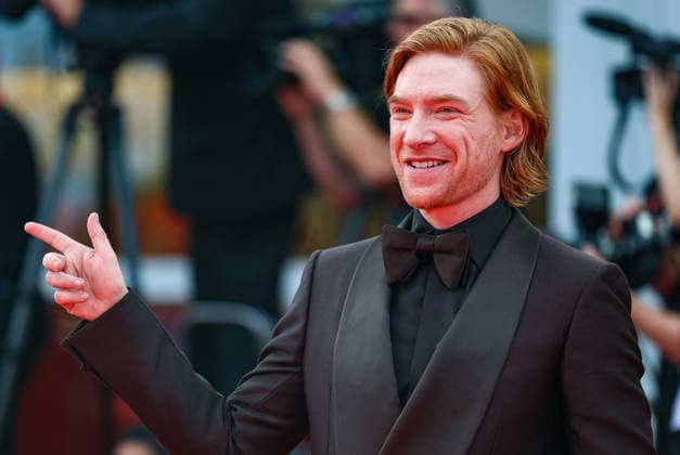 (260903) -- VENICE, Sept. 3, 2026 -- Irish actor Domhnall Gleeson poses at the red carpet before the premiere of the film Bucking Fastard during the 83rd Venice International Film Festival in Venice, Italy, Sept. 3, 2026. ) ITALY-VENICE-FILM FESTIVAL-BUCKING FASTARD-PREMIERE WangxKaiyan 