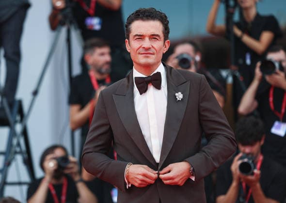 (260903) -- VENICE, Sept. 3, 2026 -- British actor Orlando Bloom poses at the red carpet before the premiere of the film Bucking Fastard during the 83rd Venice International Film Festival in Venice, Italy, Sept. 3, 2026. ) ITALY-VENICE-FILM FESTIVAL-BUCKING FASTARD-PREMIERE WangxKaiyan 