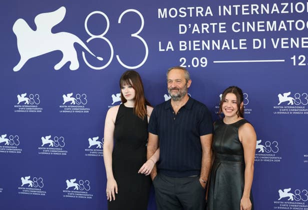 (260904) -- VENICE, Sept. 4, 2026 -- French director Cedric Kahn (C), French actress Malou Khebizi (R) and French actress Zoe Monpart of the film 15 18 (A Place To Heal) pose for the photocall during the 83rd Venice International Film Festival in Venice, Italy, Sept. 4, 2026. ) ITALY-VENICE-FILM FESTIVAL-15 18-PHOTOCALL WangxKaiyan 