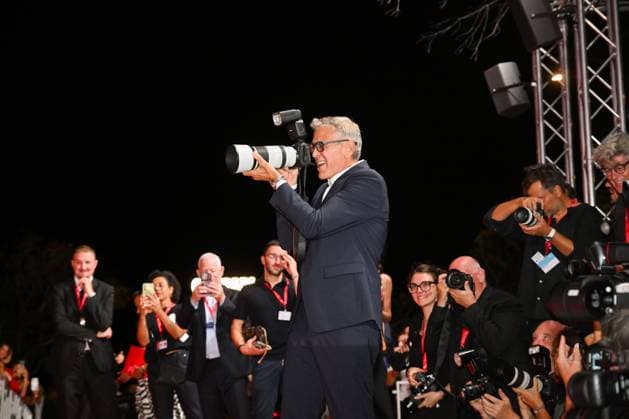 September 4, 2026, Venice, Rome, Italy: George Clooney takes a photographer s camera during the red carpet of the film Furies , 83rd Venice International Film Festival, Venice, 04 09 2026 Venice Italy  - ZUMAa289 20260904_zia_a289_459 Copyright: xMariaxLauraxAntonellix xAgfx