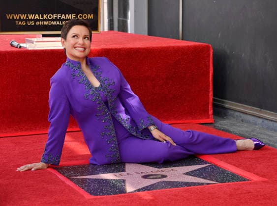 Filipina actress and singer Lea Salonga sits beside her star during an unveiling ceremony honoring her with the 2,855th star on the Hollywood Walk of Fame in Los Angeles on Friday, September 4, 2026.  LAP2026090401 JIMxRUYMEN
